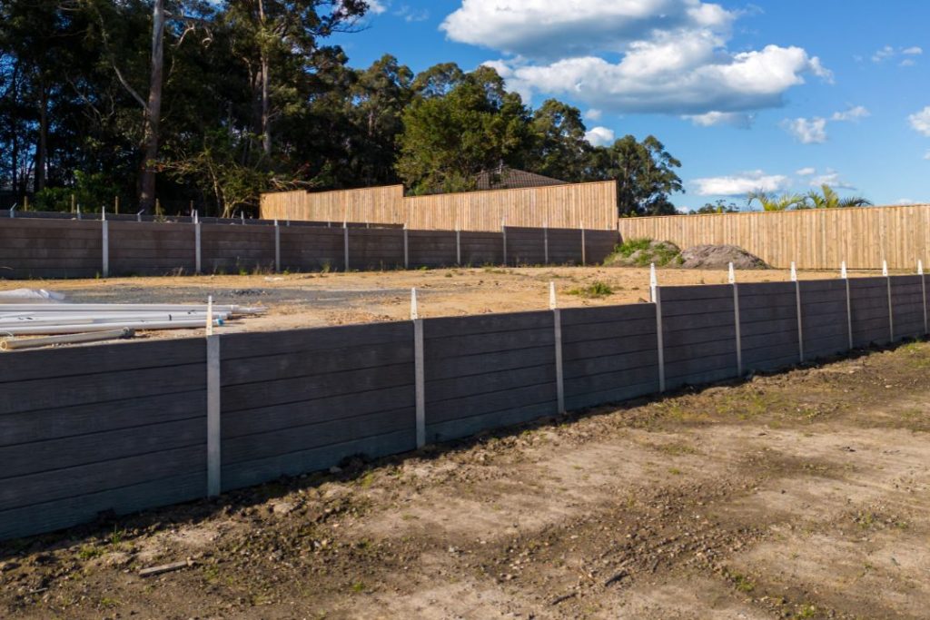 Concrete sleeper retaining walls for sloped areas
